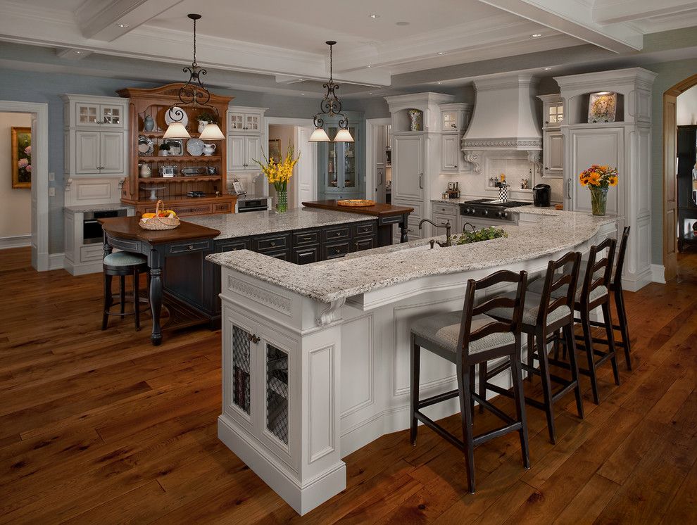 Undermain Theatre for a Traditional Kitchen with a Dual Islands and Bayside   Traditional Lakeside Estate by Visbeen Architects