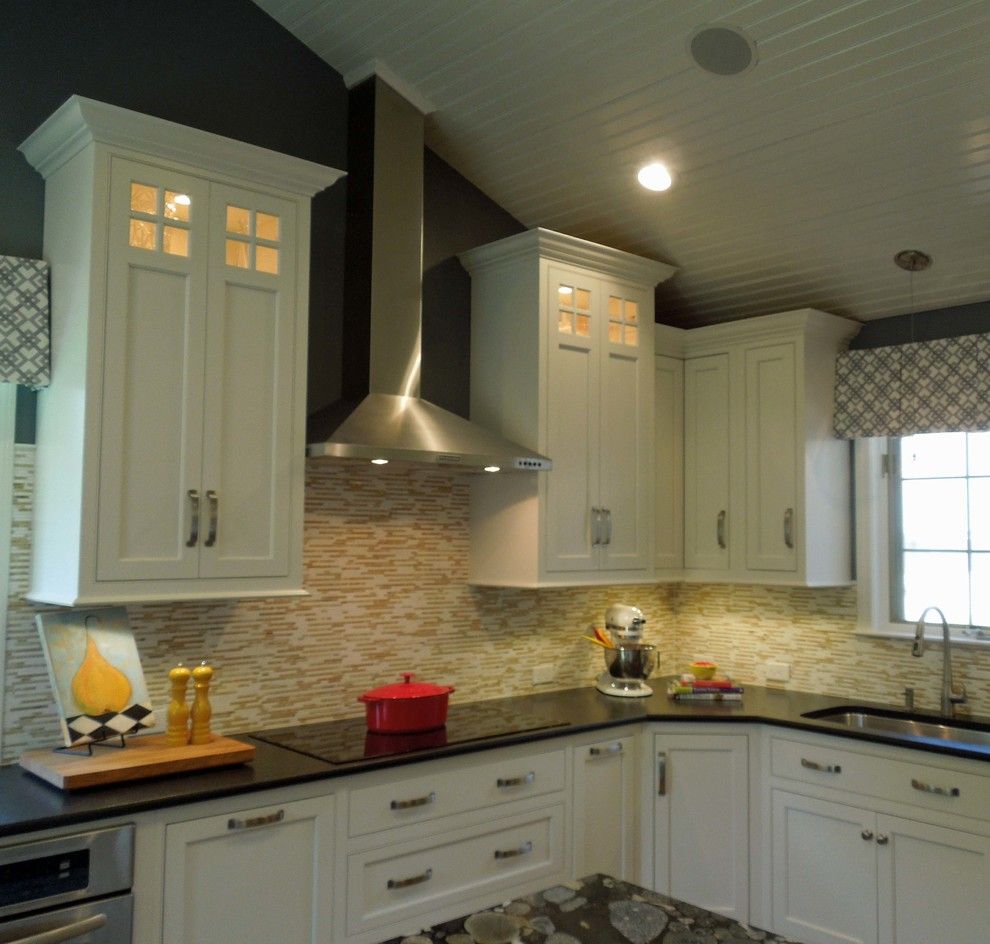 Undermain Theatre for a Traditional Kitchen with a Marble and Sloped Ceiling with Chimney Hood by Delicious Kitchens & Interiors, Llc