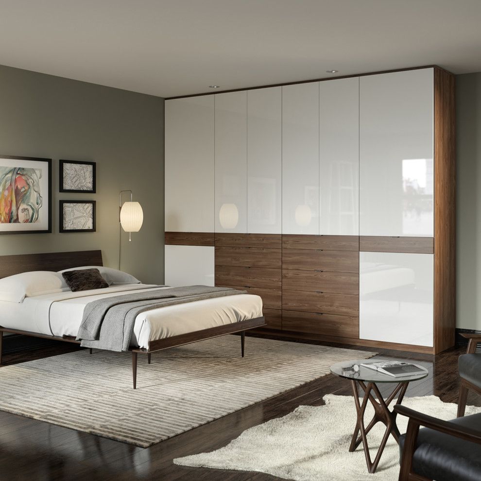 United Artist Farmingdale for a Contemporary Bedroom with a Cowhide Rug and Contemporary Bedroom by Californiaclosets.com