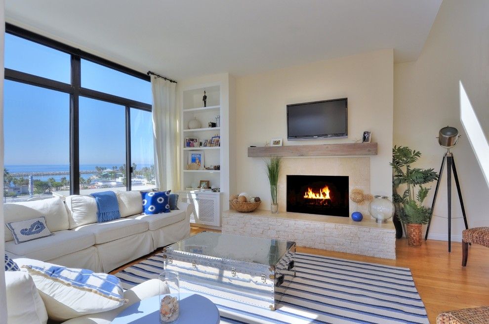 Valley View Theater for a Beach Style Living Room with a Silver Trunk Coffee Table and Redondo Beach Project by Zd Interiors