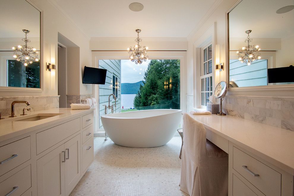 Valley View Theater for a Transitional Bathroom with a Freestanding Bathtub and Master Bathroom by Phinney Design Group