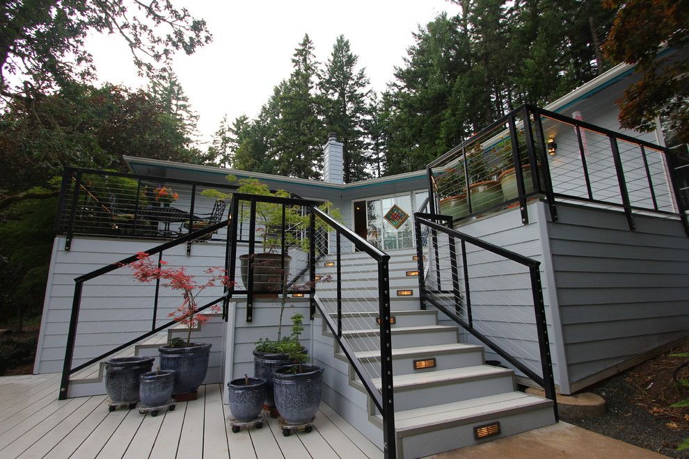 Velvet Rope Portland for a Modern Spaces with a Cable Railing System and Modern Aluminum Deck by G. Christianson Construction, Inc.