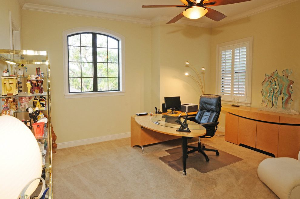 Venetian Theater for a Mediterranean Home Office with a Dark Wood and Henin Signature Homes Valentina by Henin Homes