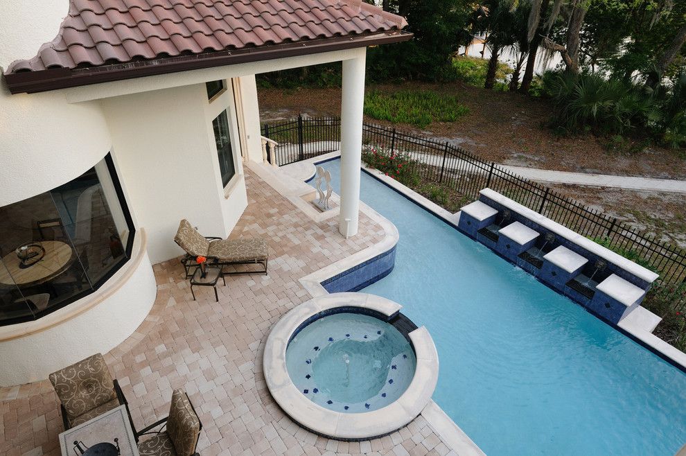 Venetian Theater for a Mediterranean Pool with a Garden Tub and Henin Signature Homes Valentina by Henin Homes