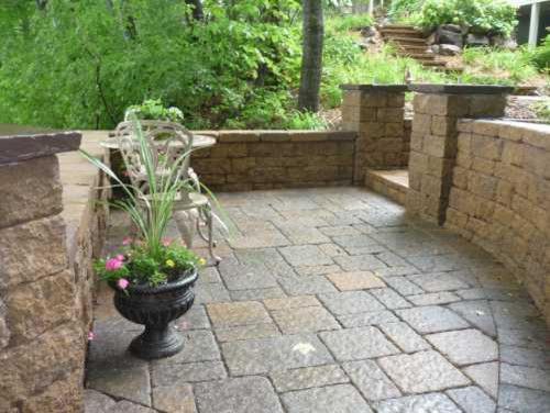 Versa Lok for a  Landscape with a Patio and Lakeside Patio with Fireplace by John Stadelman   Bachman's Landscaping