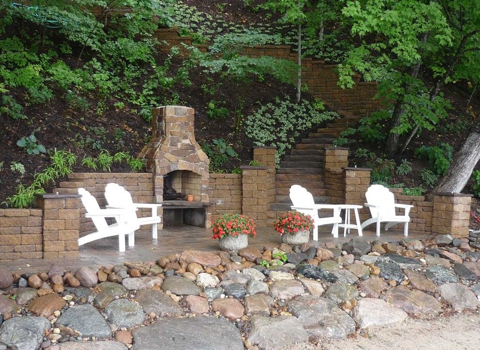 Versa Lok for a  Landscape with a Retaining Walls and Lakeside Patio with Fireplace by John Stadelman   Bachman's Landscaping