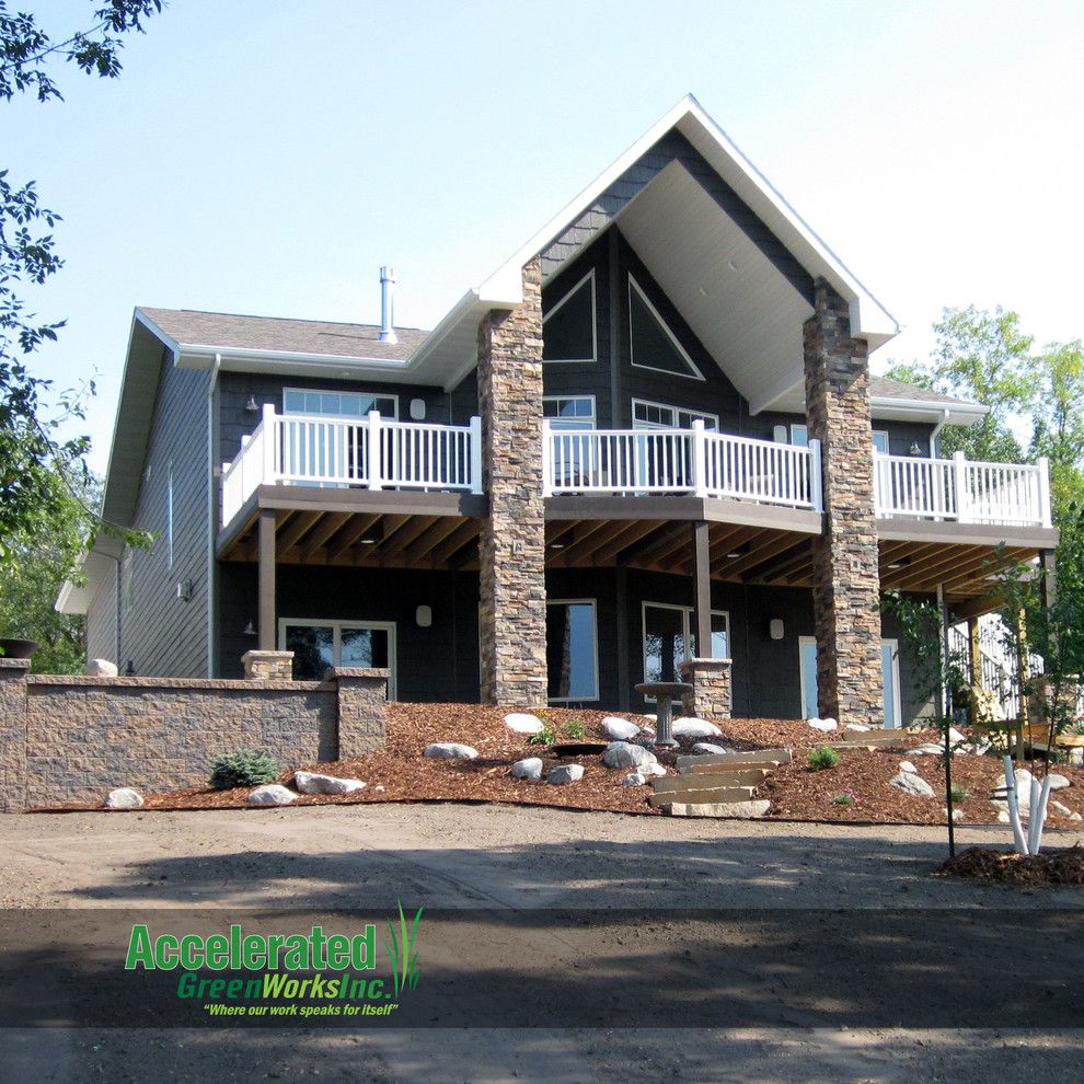 Versa Lok for a Traditional Exterior with a Accelerated Green Works and Landscaping Design Ideas by Accelerated Green Works, Inc.