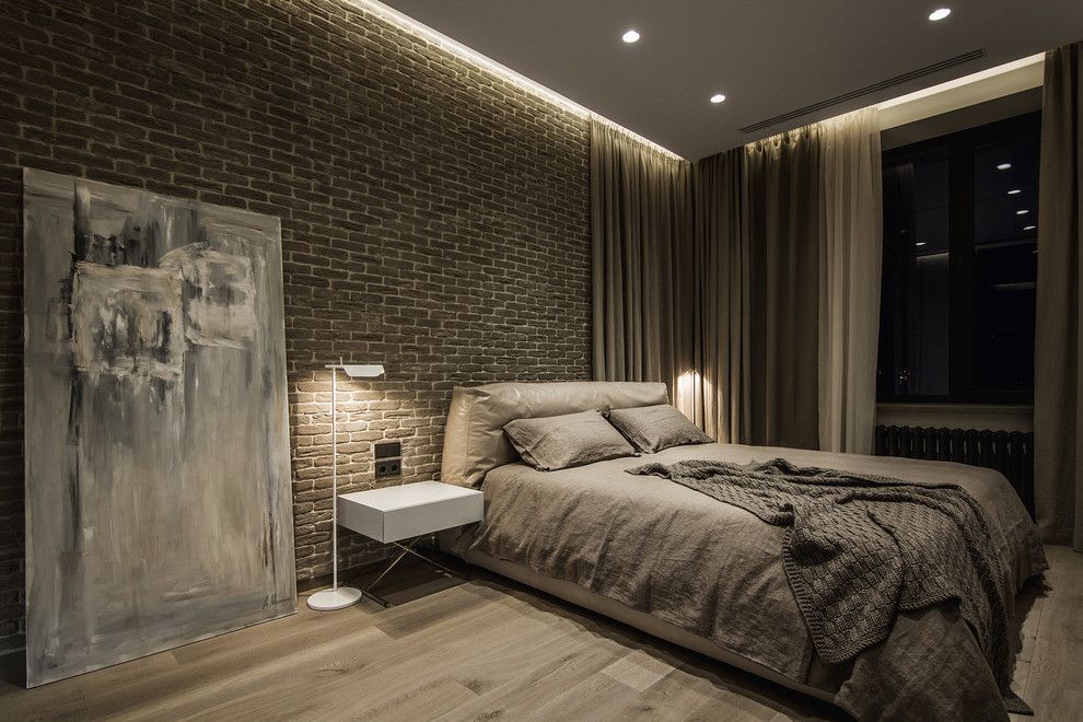 Victors Lighting for a Contemporary Bedroom with a Side Table and Apartment Artist by YØdezeen