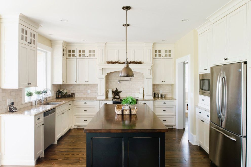 Vinegar Window Cleaner for a Traditional Kitchen with a Window Ledge and Farmhouse by Rockridge Fine Homes