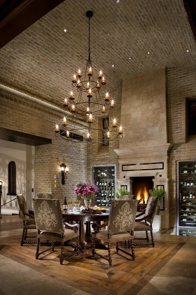 Vistal Golf for a Mediterranean Dining Room with a Wine Cellar and Old World Brick Dining Room by Eldorado Stone