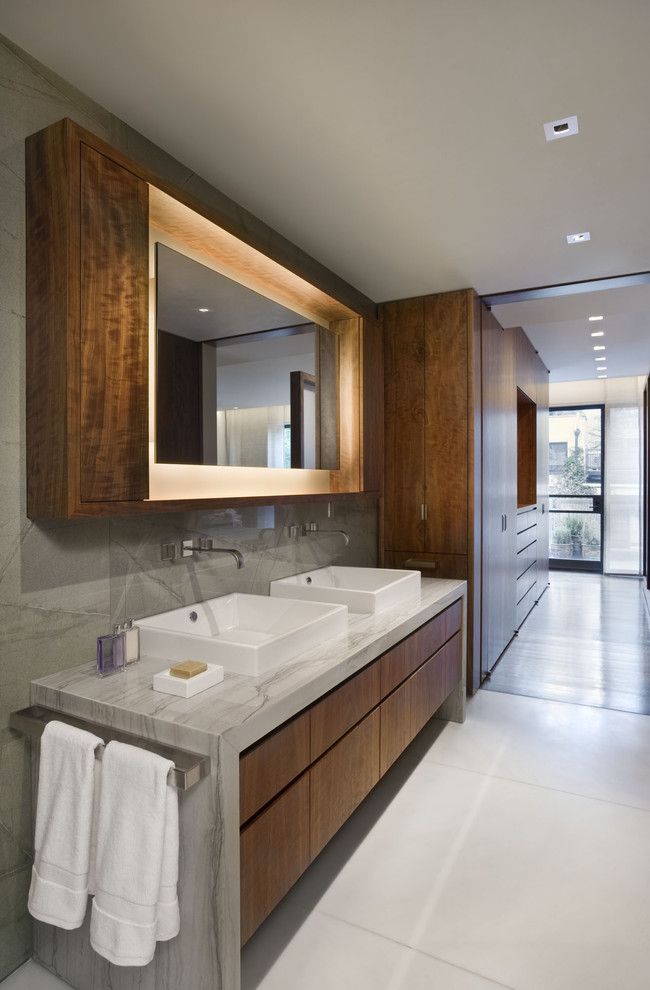 Vitreous China for a Contemporary Bathroom with a Custom Wood Cabinets and West Village Townhouse by David Howell Design