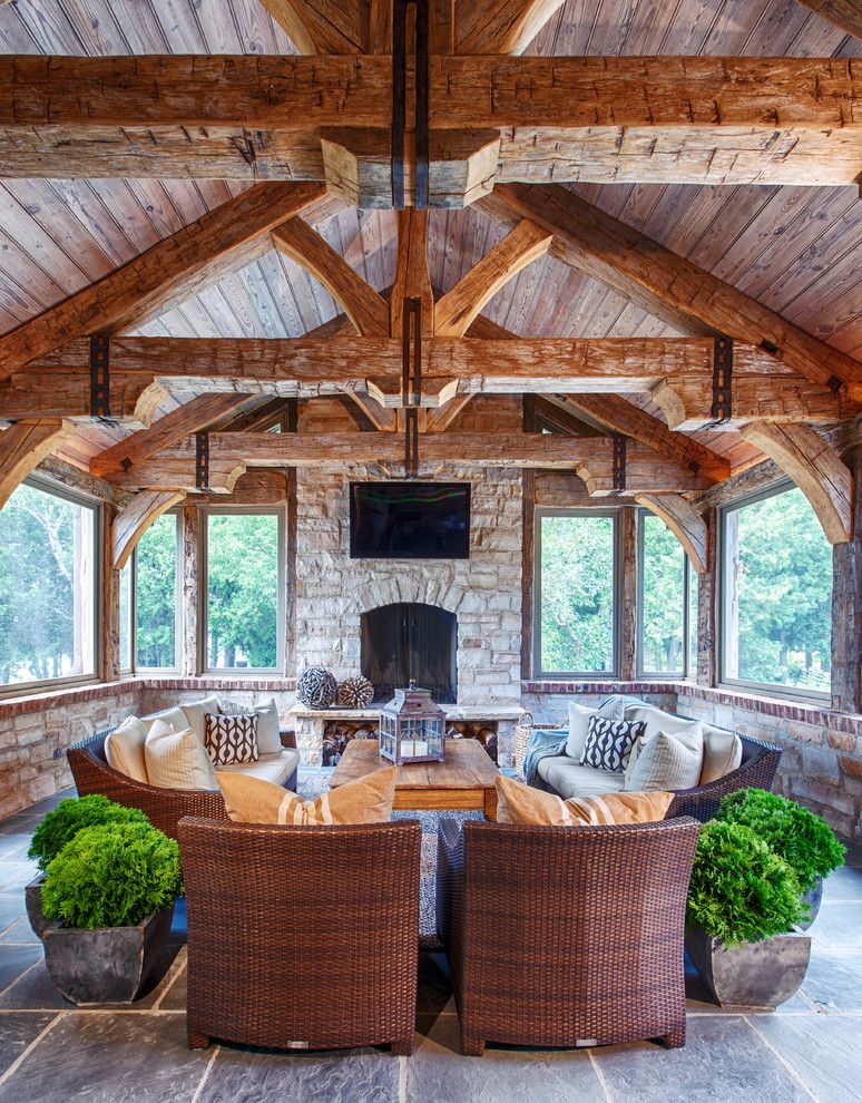 Waller Rustic Furniture for a Rustic Family Room with a Sloped Ceilings and Rustic Elegance by Deleers Construction, Inc.