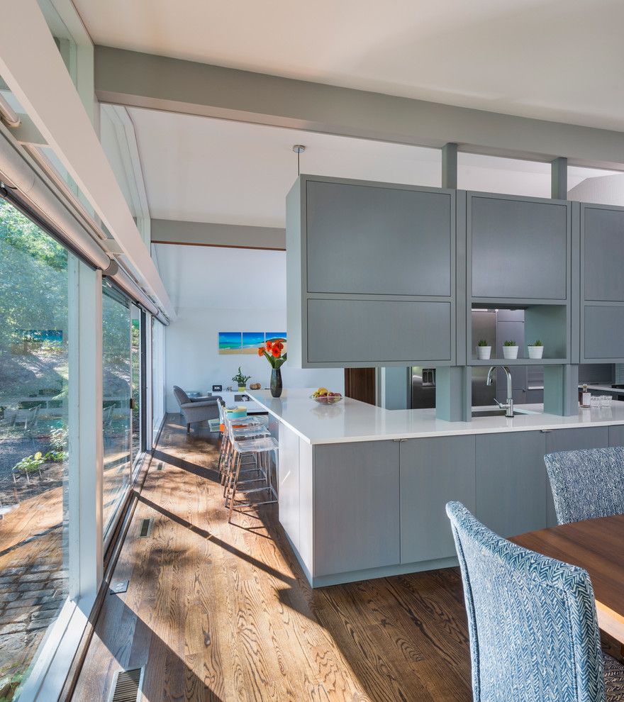 Walter Gropius for a Midcentury Dining Room with a White Counter Top and Mid Century Remodel on Tabor Hill by Flavin Architects