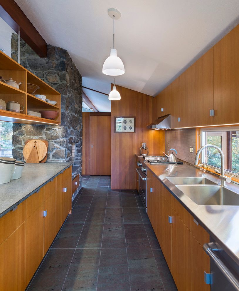 Walter Gropius for a Midcentury Kitchen with a Unfading Mottled Green and Purple Slate and Sculpted to the Land by Flavin Architects