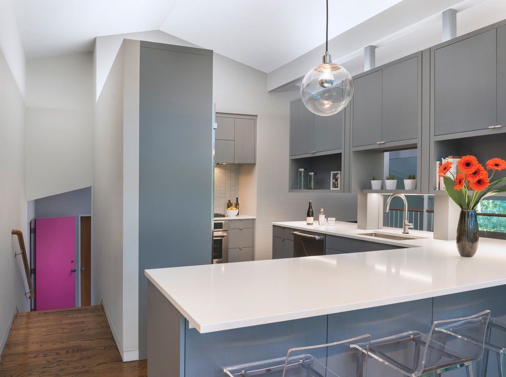 Walter Gropius for a Midcentury Kitchen with a White Counter Top and Mid Century Remodel on Tabor Hill by Flavin Architects