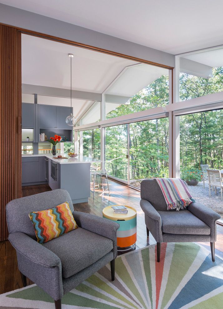 Walter Gropius for a Midcentury Living Room with a Custom Cabinets and Mid Century Remodel on Tabor Hill by Flavin Architects