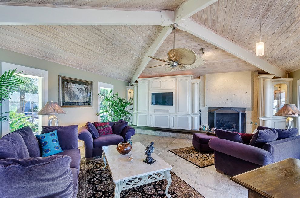 Wardley Real Estate for a Tropical Living Room with a Column and 259 Sabine Pensacola Beach, Fl by Emerald Coast Real Estate Photography