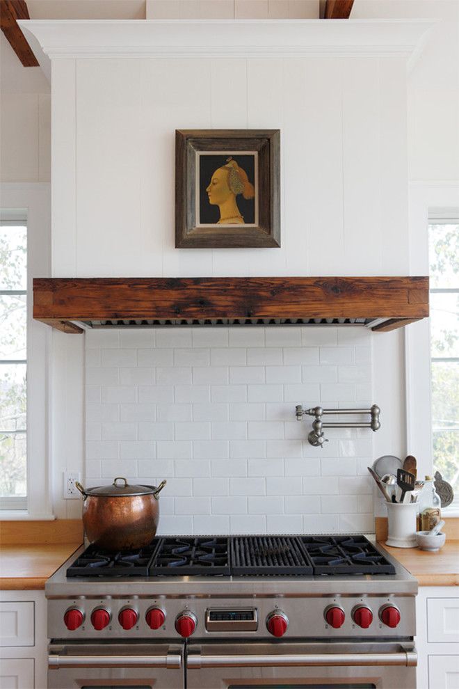 Weathering Steel for a Farmhouse Kitchen with a Pot Filler and Light Farm Kitchen by Sullivan Building & Design Group