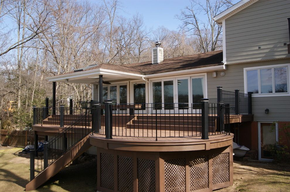 Weichert Nj for a Traditional Deck with a Round Deck and Piano Deck    Round Azek Deck with with Custom Rails a View by Deck Remodelers.com