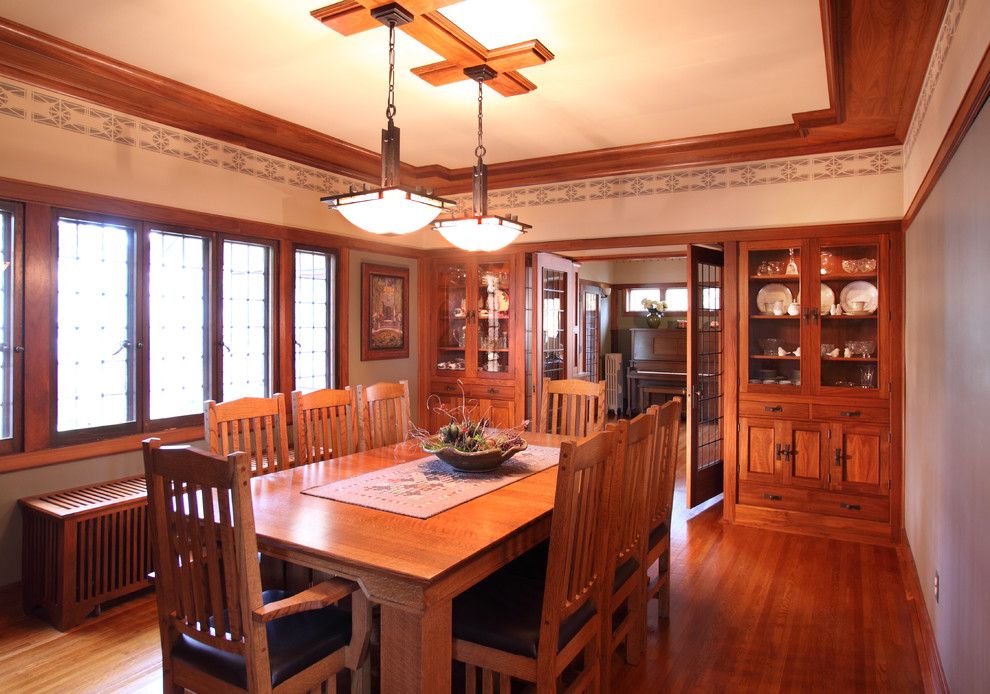 Westwind Homes for a Craftsman Dining Room with a Custom Light and 1926 Elmslie Home Renovation by Westwind Woodworkers Inc.