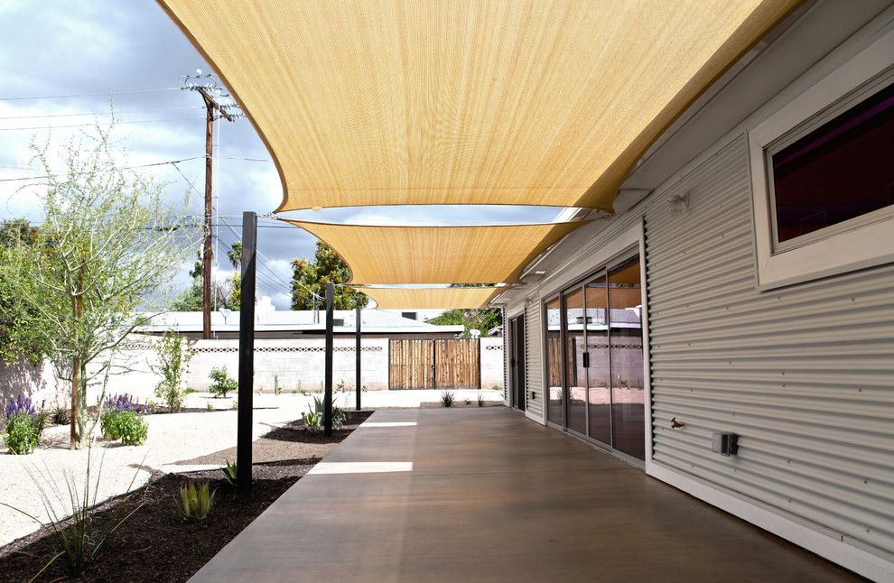 What is a Chiver for a Industrial Patio with a Corrugated Metal and the Castaway House by the Ranch Mine