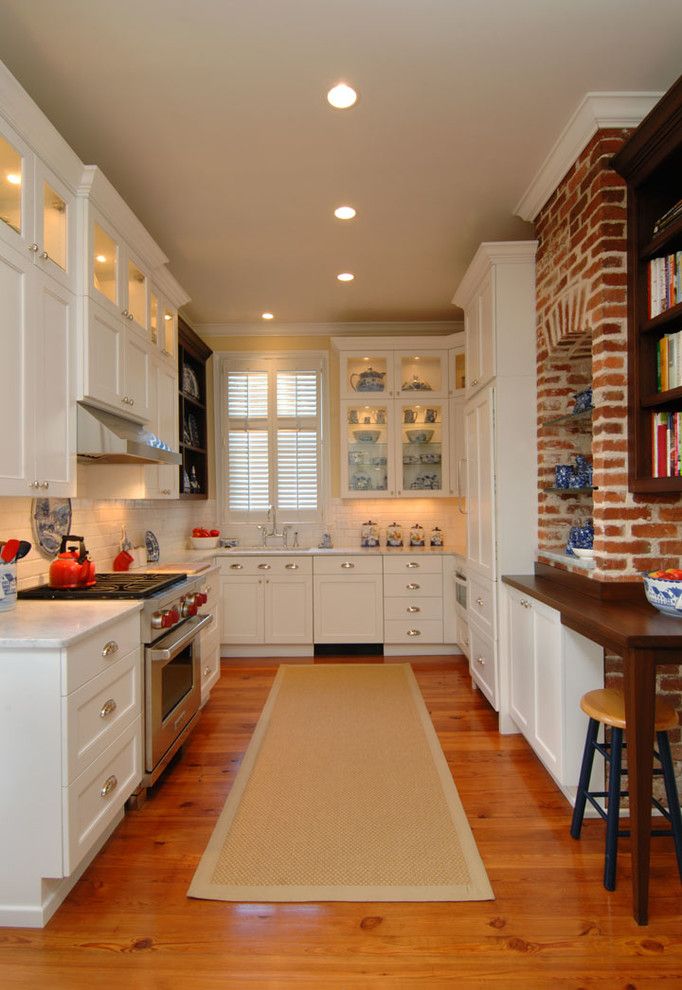 Whistling Kettle for a Traditional Kitchen with a Mahogany Countertop and Legare Street Condo by Classic Remodeling & Construction, Inc.