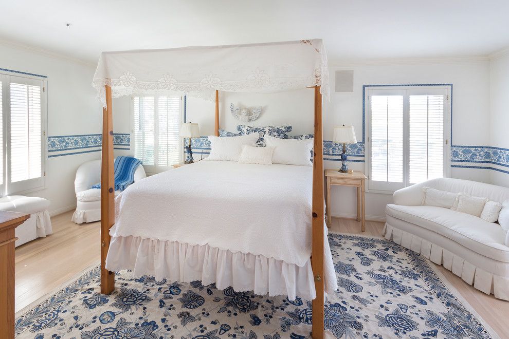 White Stallion Ranch for a Traditional Bedroom with a Light Wood Side Table and Citrus Ranch Property One by Peter D'aprix Photography