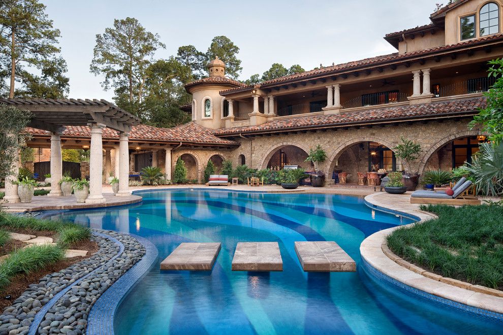 Wholesale Builders Supply for a Mediterranean Pool with a Covered Patio and Memorial Moroccan by Jauregui Architect Builder