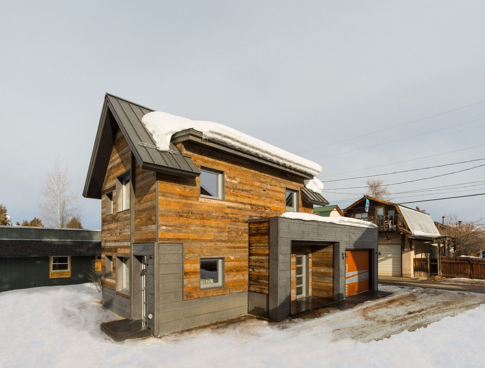 Wimsatt Building Materials for a Contemporary Exterior with a Metal Roof and Diagon Alley Passive House by Workshopl