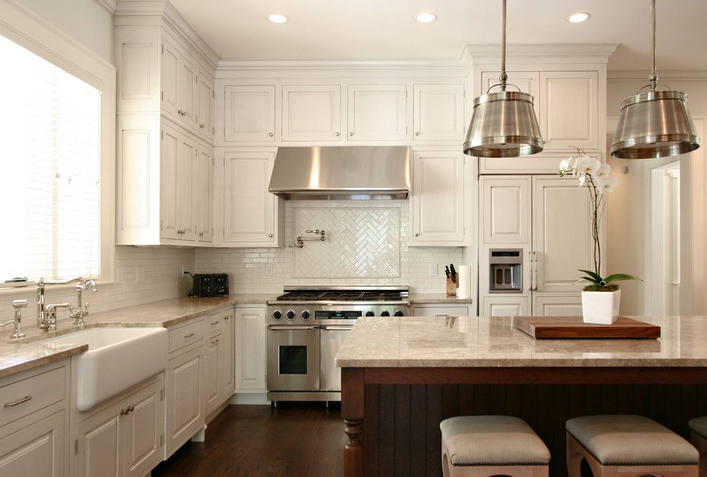 Wimsatt Building Materials for a Traditional Kitchen with a Panel Refrigerator and Kitchen by Dresser Homes