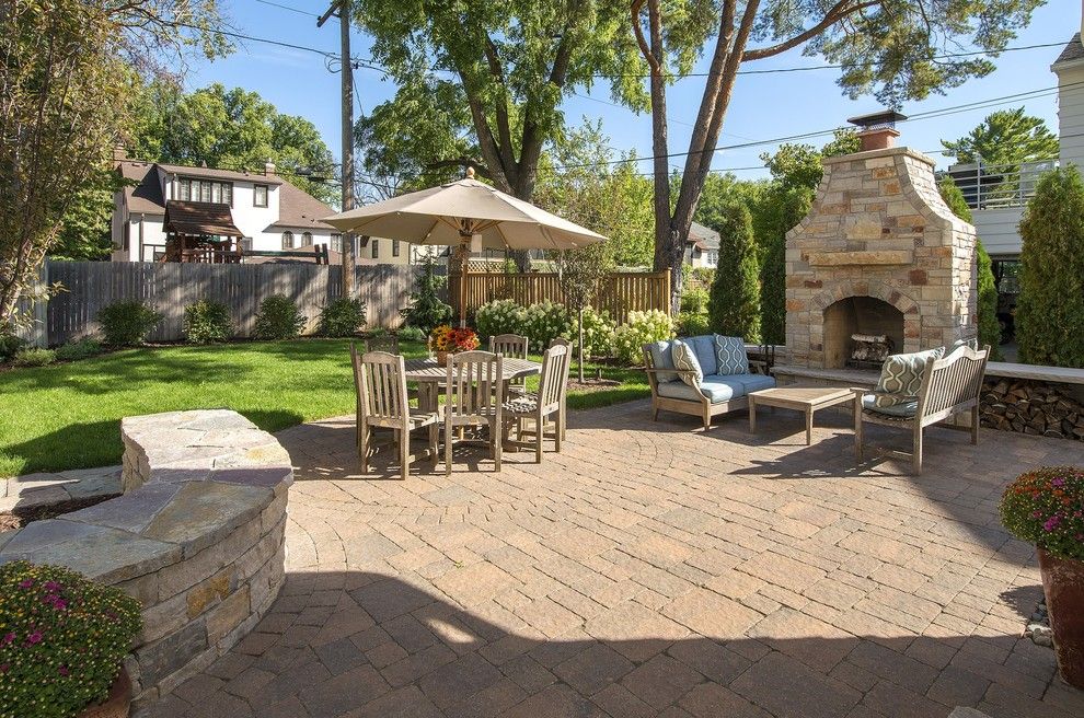 Windermere Country Club for a Transitional Patio with a Outdoor Fireplace and Country Club Project Remodel by Great Neighborhood Homes