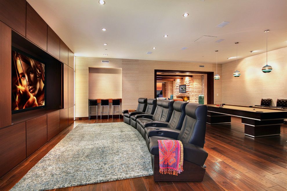 Winnetka Movie Theater for a Contemporary Home Theater with a Black Counter Stool and Strand Beach by Jeri Koegel Photography