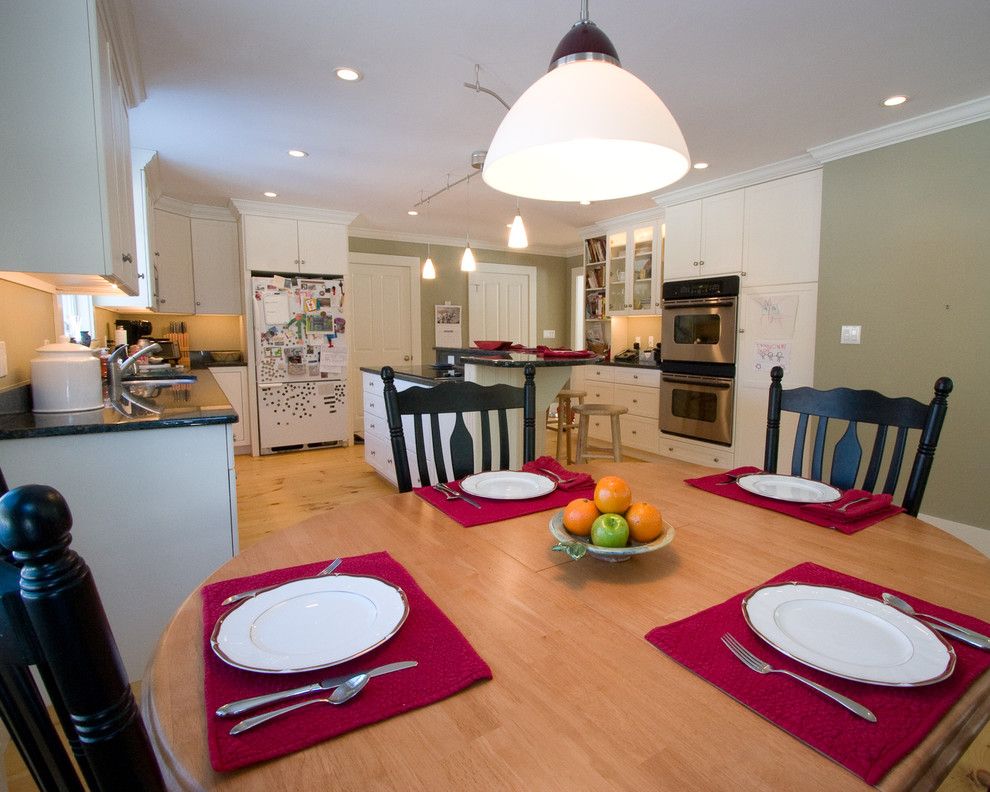 Winston Flowers Boston for a Farmhouse Kitchen with a Wood Kitchen Table and Colonial Farmhouse Remodel by Dsa Architects