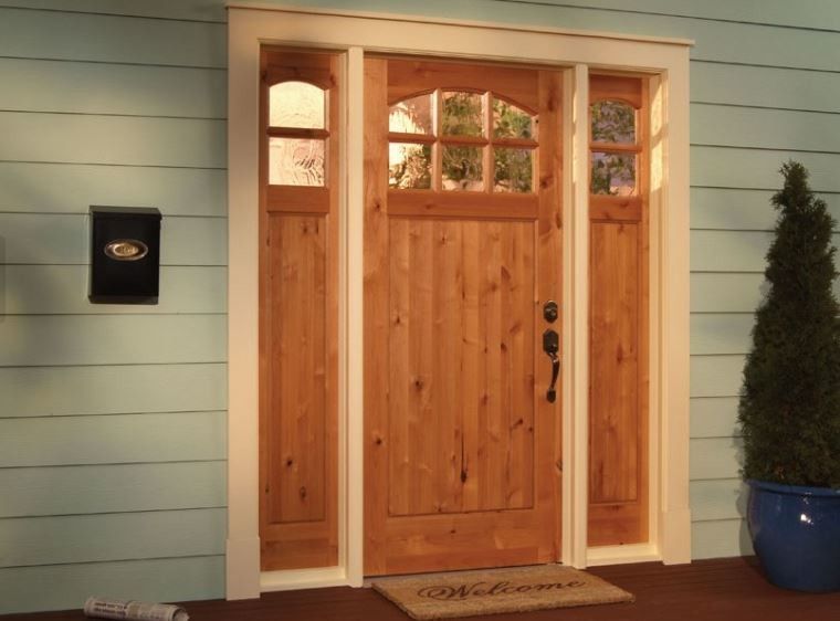 Woodgrain Doors for a Traditional Exterior with a Exterior Door and Curb Appeal with a New Front Door by Southern Supply