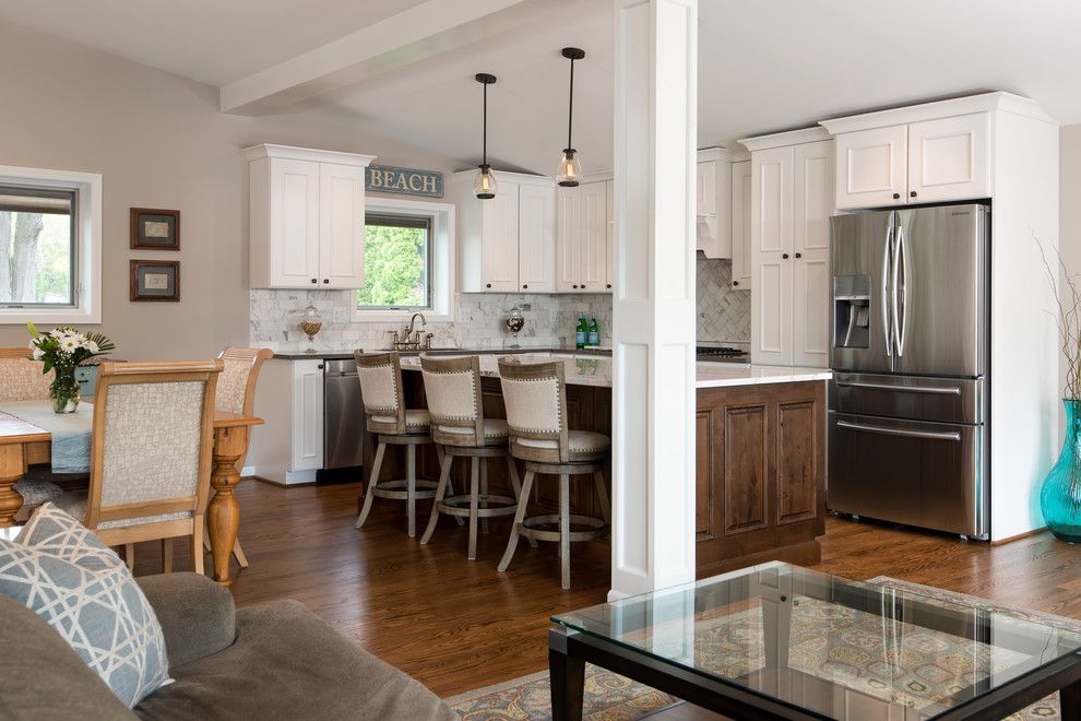 Zodiaq Countertops for a Transitional Kitchen with a Cambria Quartz Countertops and Commerce Township Lakeside Kitchen by Andrea Serrico