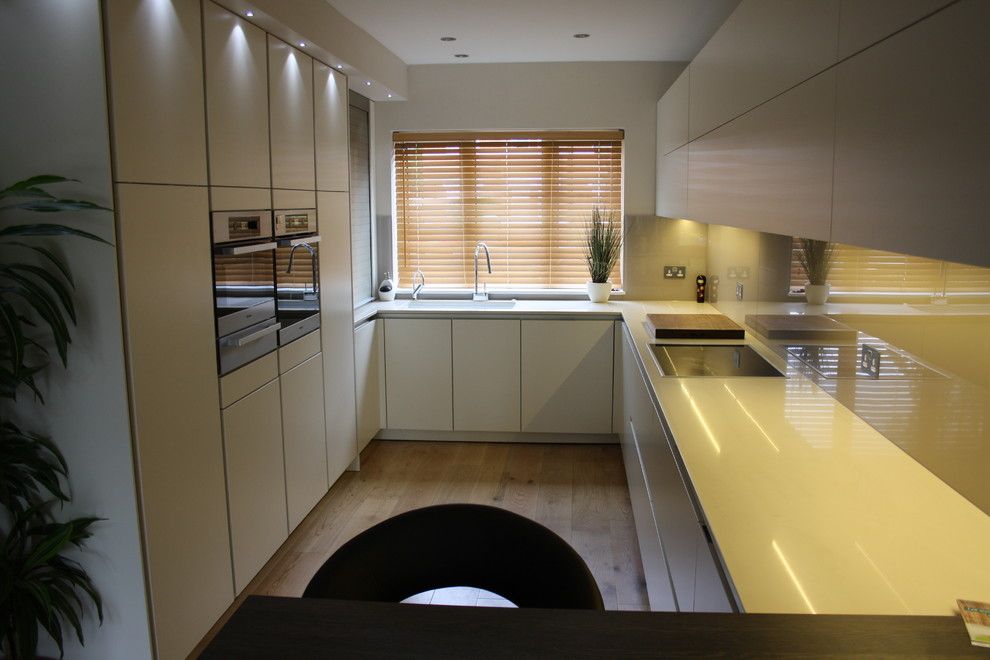 Zucchetti for a Contemporary Kitchen with a Glass Splashback and Tw1 by John Roberts Design Ltd